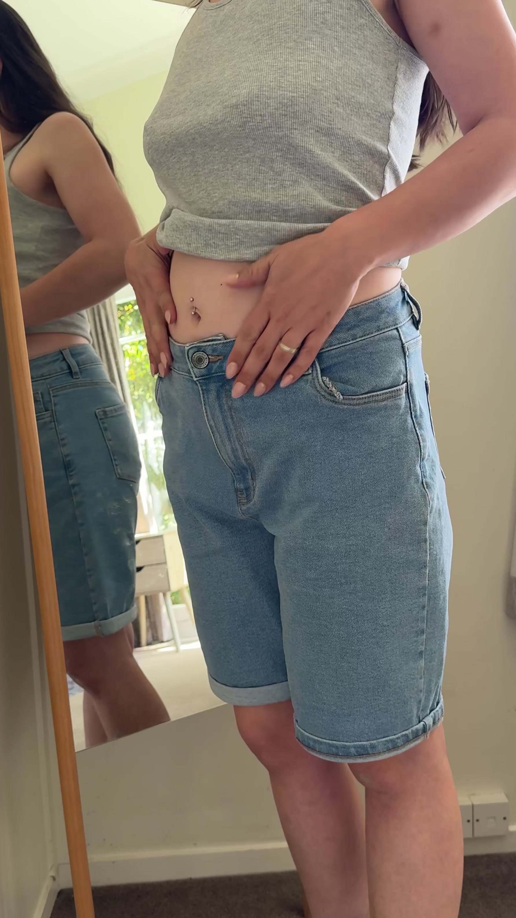 Jeans waistband check in a mirror